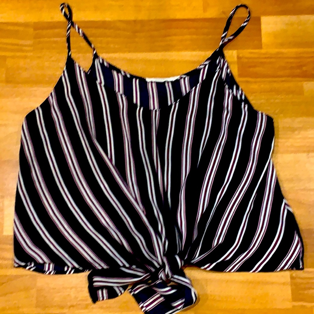 A purple pink and white top.